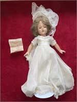 Antique doll and wedding dress