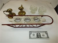 Sleigh, brass and glass candleholders