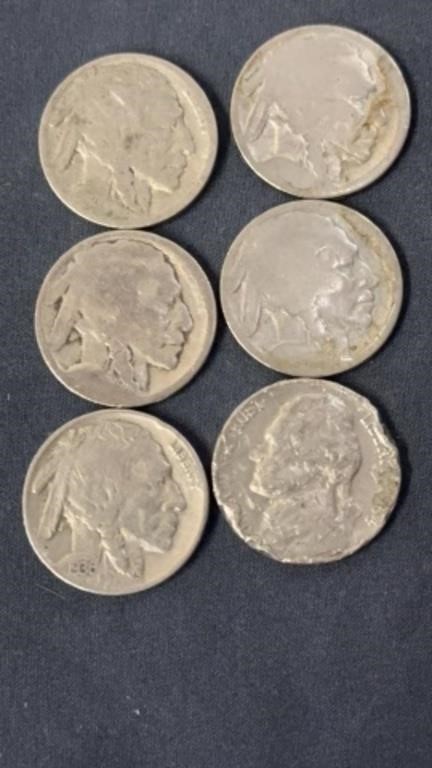 Five Buffalo nickels one has a date of 1936 with