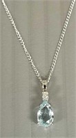 14K white gold pendant on chain set with