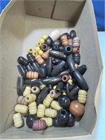 Shoebox of wooden beads ready for crafting