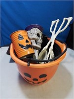 Plastic bucket and other Halloween decorations