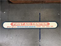 Johnson and Johnson first aid center vintage sign
