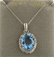 10kt Gold Oval Blue Topaz & Diamond Pendant