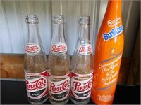 Vintage soda bottles: 3 sparkling Pepsi Cola -