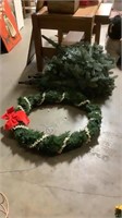 Lighted wreath and unlit tree