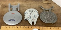 3 toy spaceships