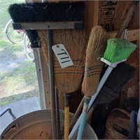BROOMS IN  TRASH CAN