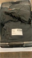 1 Lot - 1 Box Full of Black Collared Shirts./