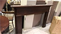 Antique solid walnut fireplace mantle came out of