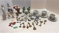 Misc tea cups & figurines.