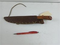 Handmade knife with 7-in blade and leather sheath