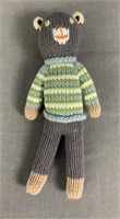 Blabla hand knitted rattle. Schoolbook boy bear.