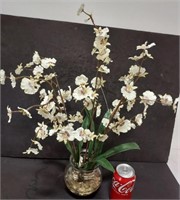 Floral arrangement in glass vase