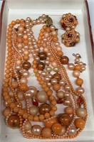 Vintage bright orange costume necklace and clip