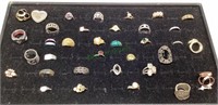 Tray of assorted costume jewelry rings in assorted