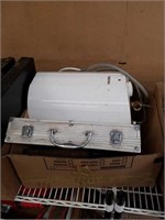 Box of electric water heater and briefcase