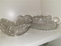 Heavy glass bowl, 11" x 7" and 3 serving dishes
