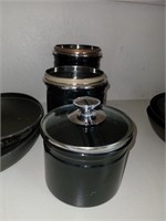 Set of three canisters with lids