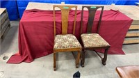 Two antique wooden chairs. Each measures