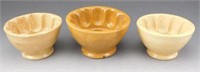 Lot # 3852 - (3) Yellow ware pudding molds