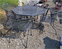 (Z)  Outdoor table w/ four chairs