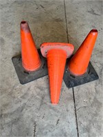 3 orange caution cones