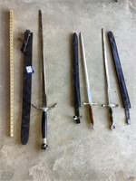 Three swords with sheaths