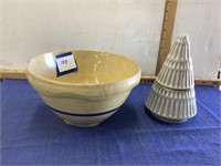5 inch tall stoneware bowl, cracked, and candle