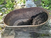 Cast iron oval pot 10” deep, 25” long.  Cracked