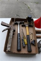 Hammers, caulking gun, funnels, measuring tape,
