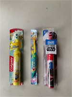 Kids Two power toothbrushes, and one manual