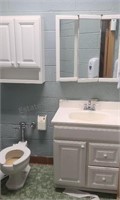 Upper and lower bathroom cabinets. Buyer must