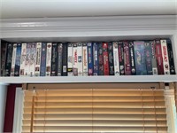 2 shelves of movies