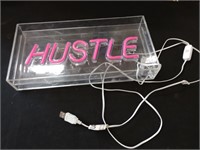 Hustle neon sign