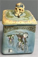 Majolica Tobacco Jar Skull & Bicycle Riders