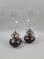 2 clear glass matching oil lamps