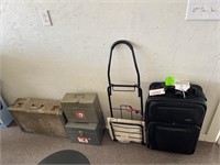 2 suitcases, 2 metal tins, wheeled cart