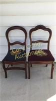 Two Victorian walnut side chairs