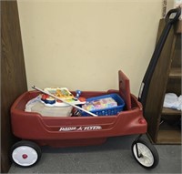 Radio Flyer plastic wagon with toys