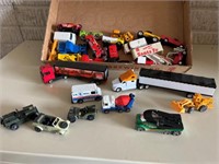 Flat of cars trucks toy lot.