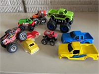 Various Monster Truck toy lot.