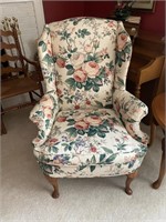 Two floral wingback chairs