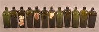 12 Various 18th C. Olive Green Case Bottles.
