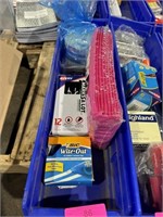 blue Fastenal bins filled with office supplies