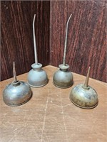 FOUR SMALL VINTAGE OIL CANS