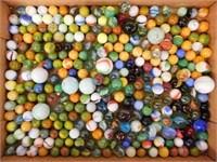 Flat of glass marbles including 11 shooters