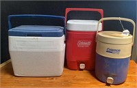 Two Coleman Water Jugs and Coleman Cooler