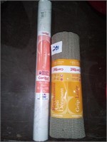 A roll of kitchen contact paper and a roll of