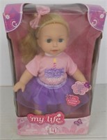 My Life Lil birthday girl doll.